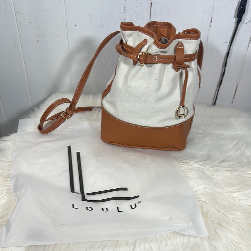Tan and White Canvas Leather Backpack with Drawstring Closure